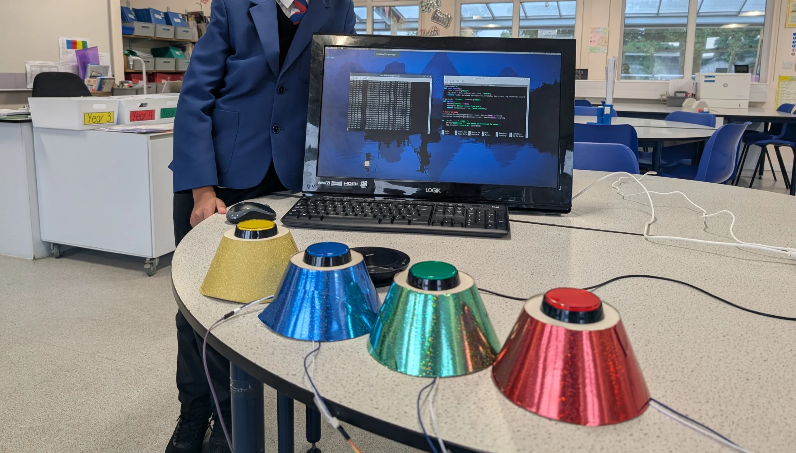 Creativity and Innovation; pupil-developed buzzer system generates House Quiz excitement